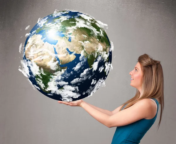 Pretty girl holding 3d planet earth — Stock Photo, Image