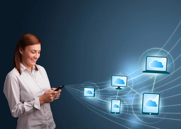 Pretty lady typing on smartphone with cloud computing — Stock Photo, Image