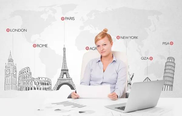 Beautiful businesswoman with world map and major landmarks of th — Stock Photo, Image
