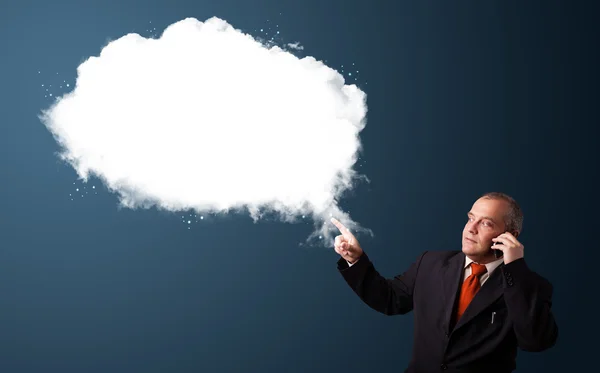 Biznesmen, co telefon i przedstawienie kopii streszczenie chmura — Zdjęcie stockowe
