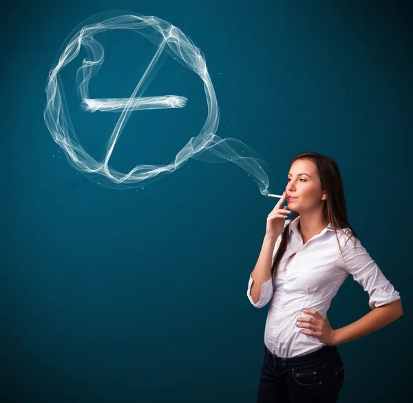 Young lady smoking unhealthy cigarette with no smoking sign — Stock Photo, Image