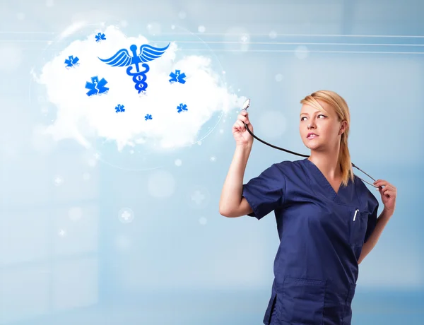 Joven médico con nube abstracta e iconos médicos —  Fotos de Stock