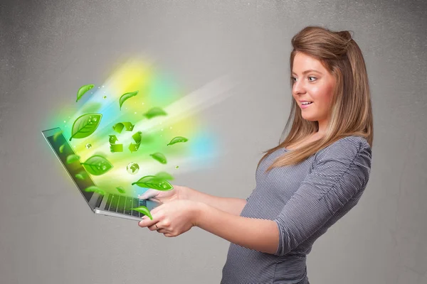 Casual woman holding notebook with recycle and environmental sym — Stock Photo, Image