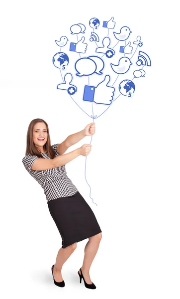 Gelukkig dame met sociaal pictogram ballon — Stockfoto