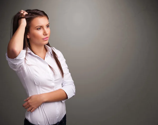 Beautiful woman thinking with empty copy space — Stock Photo, Image
