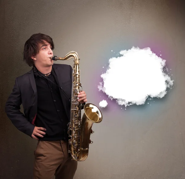 Young man playing on saxophone with copy space in white cloud — Stock Photo, Image