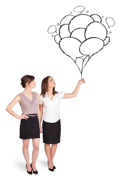 Feliz mujer sosteniendo globos dibujo — Foto de Stock