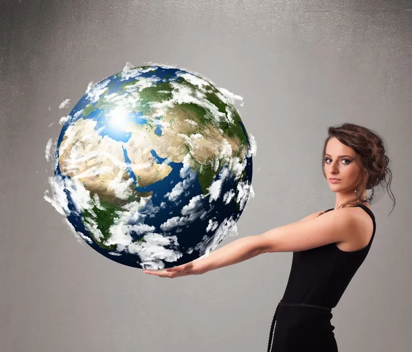 Vacker flicka som håller 3D-planeten jorden — Stockfoto