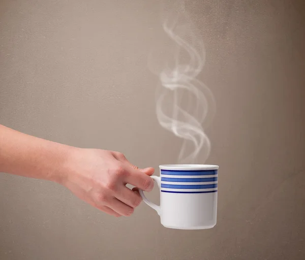 Coffee cup with abstract white steam