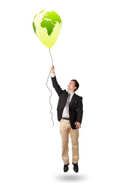 Hombre guapo sosteniendo un globo globo verde —  Fotos de Stock