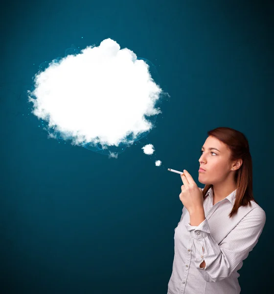 Young woman smoking unhealthy cigarette with dense smoke — Stock Photo, Image