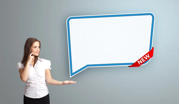 Young woman standing next to a modern speech bubble copy space a — Stock Photo, Image