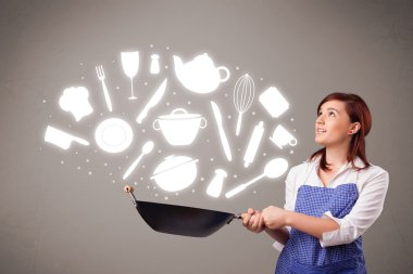 Mutfak aksesuar ikonlarıyla genç bir kadın.