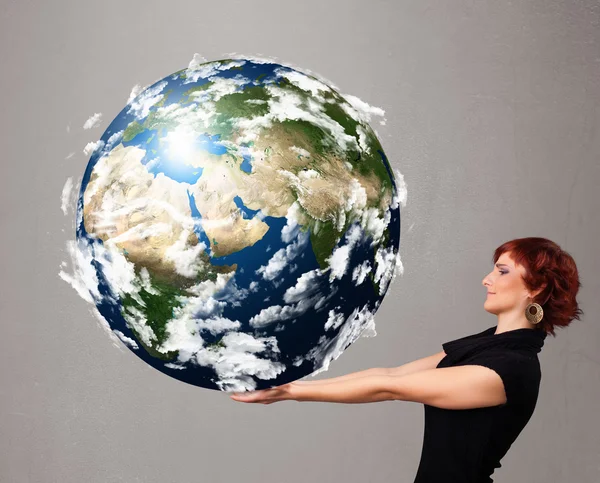 Pretty girl holding 3d planet earth — Stock Photo, Image