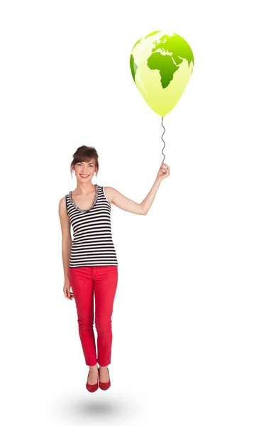 快乐的女士拿着绿色的气球 — 图库照片