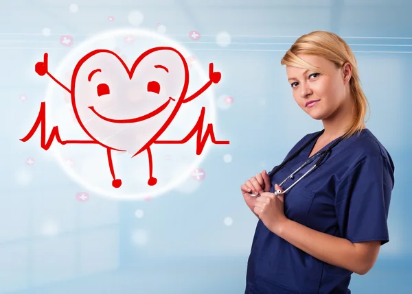 Attractive doctor with happy red smiling heart — Stock Photo, Image