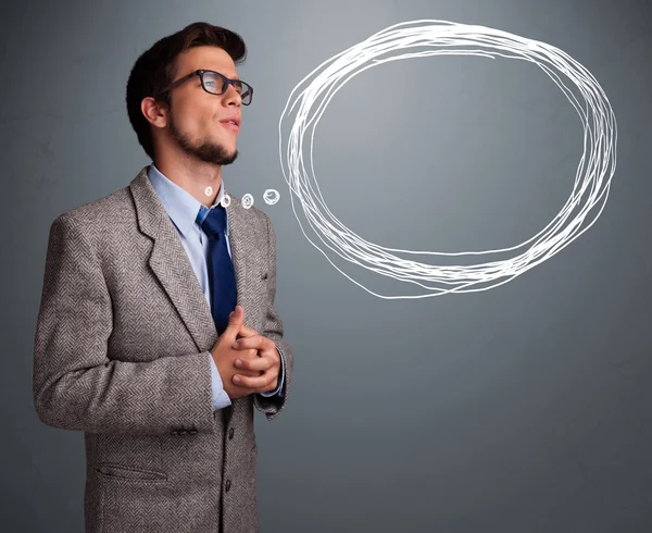 Good-looking man thinking about speech or thought bubble with co — Stock Photo, Image