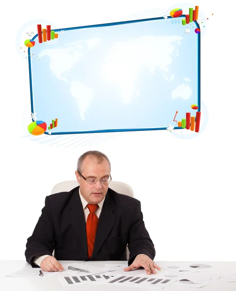 Businessman sitting at desk with copy space — Stock Photo, Image