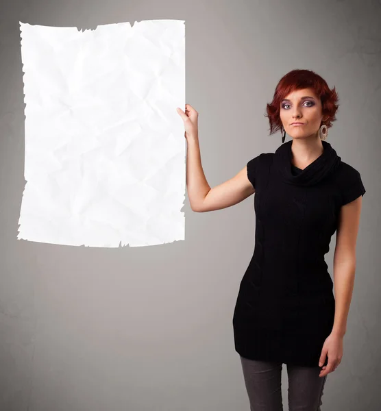 Young girl holding crumpled white paper copy space — Stock Photo, Image