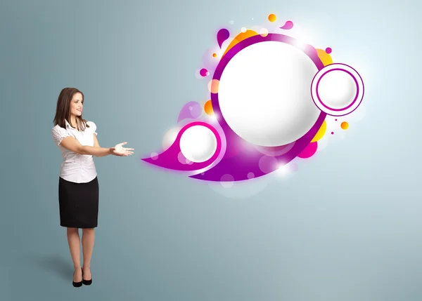 Attractive woman presenting abstract speech bubble copy space — Stock Photo, Image