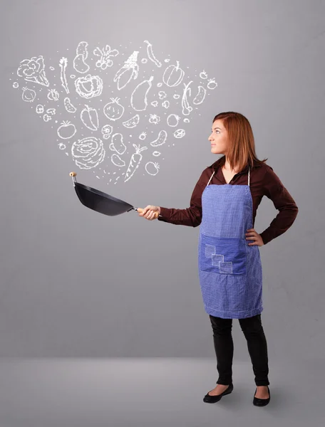 Woman cooking vegetables — Stock Photo, Image