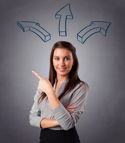 Pretty lady thinking with arrows overhead — Stock Photo, Image