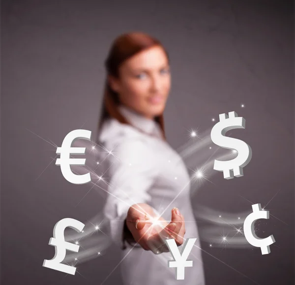 Young lady throwing currency icons — Stock Photo, Image