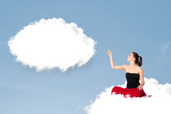 Young girl sitting on cloud and thinking of abstract speech bubb — Stock Photo, Image