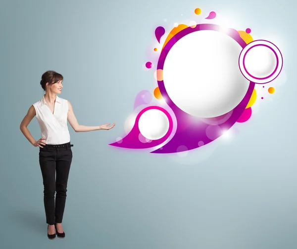 Attractive woman presenting abstract speech bubble copy space — Stock Photo, Image