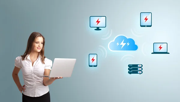 Young woman holding a laptop and presenting cloud computing netw — Stock Photo, Image