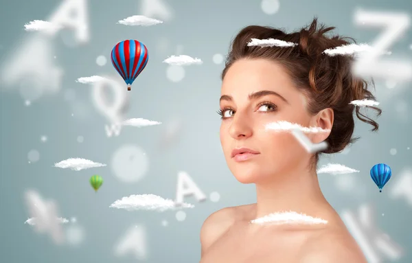 Beautiful young woman with wellness and healthcare clouds — Stock Photo, Image