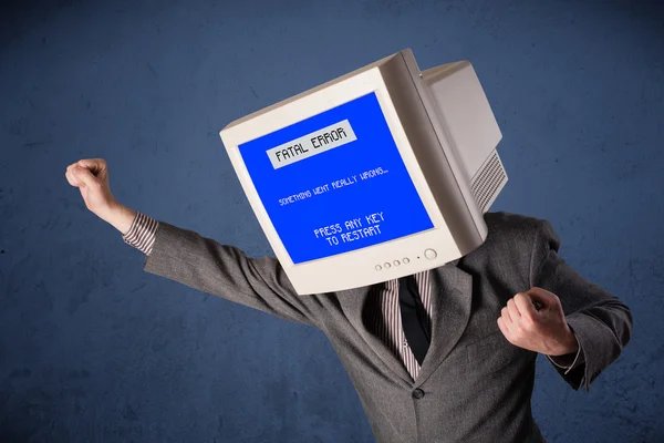 Person with a monitor head and fatal error blue screen on the di — Stock Photo, Image