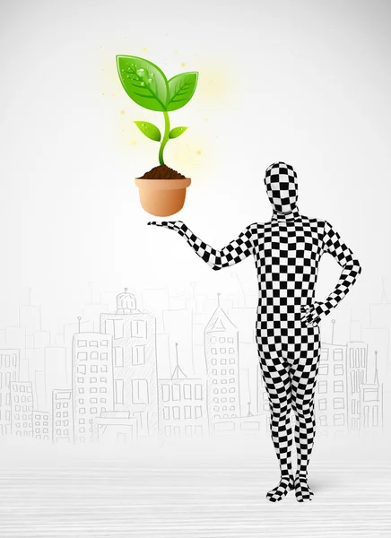 Man in full body suit with eco plant — Stock Photo, Image