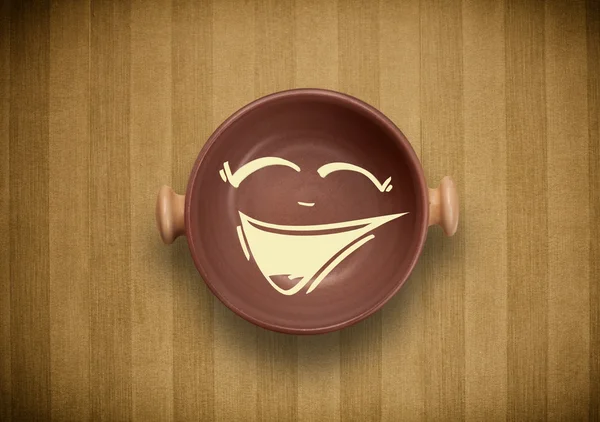 Happy smiley visage de dessin animé sur plaque de plat coloré — Photo