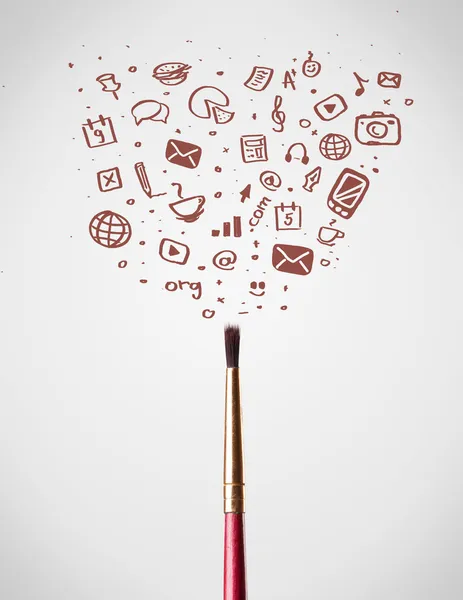 Brush close-up with social media icons — Stock Photo, Image