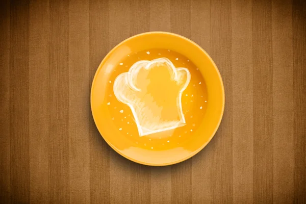 Красочная тарелка с изображением белого шеф-повара — стоковое фото