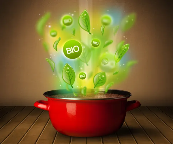 Bio signs coming out from cooking pot — Stock Photo, Image