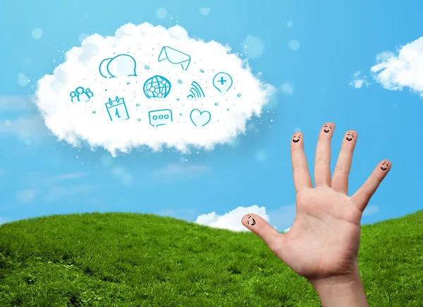 Happy smiley fingers looking at cloud with blue social icons and — Stock Photo, Image