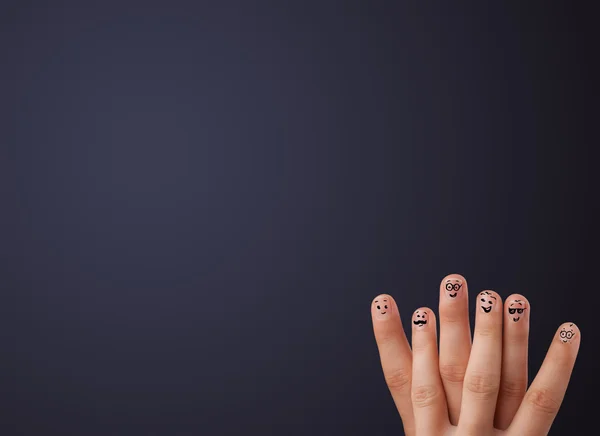 Happy smiley fingers looking at empty wall copyspace — Stock Photo, Image