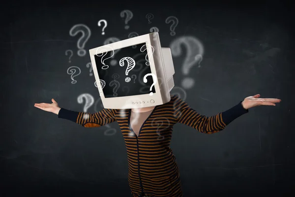 Casual woman with a pc monitor head question marks comming out — Stock Photo, Image