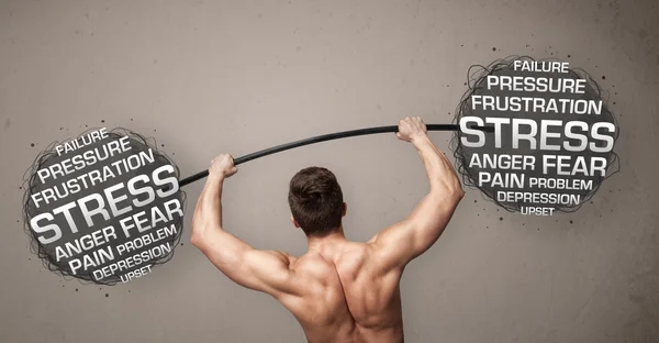 Muscular man fighting with stress — Stock Photo, Image