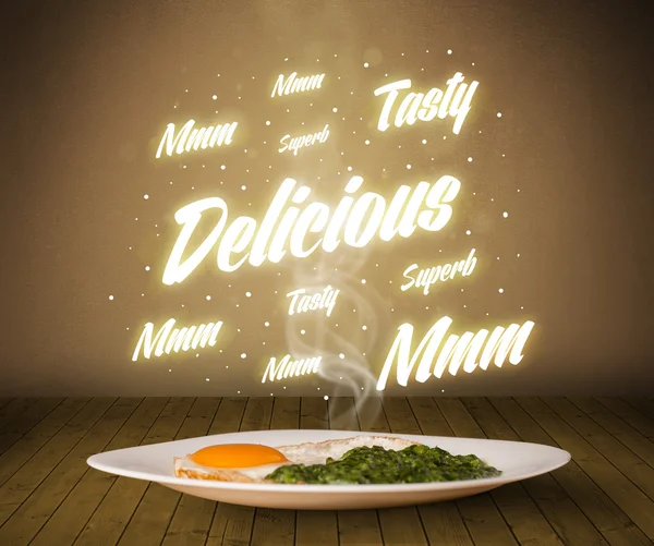 Food plate with delicious and tasty glowing writings — Stock Photo, Image