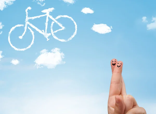 Happy smiley fingers looking at a bicycle shapeed cloud — Stock Photo, Image