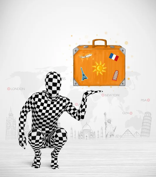 Man in full body suit presenting vacation suitcase — Stock Photo, Image