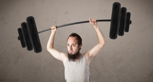 Funny skinny guy lifting weights — Stock Photo, Image