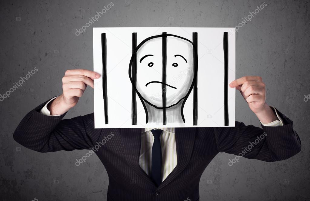 Businessman holding a paper with a prisoner behind the bars on i