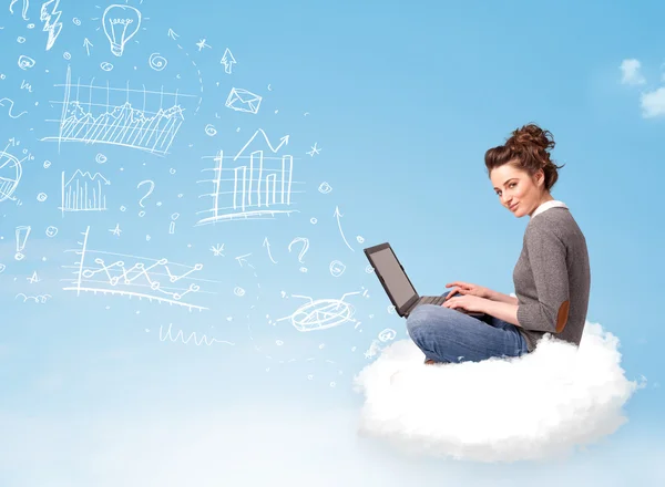 Young woman sitting in cloud with laptop — Stock Photo, Image