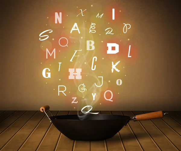 Glowing letters coming out from cooking pot — Stock Photo, Image