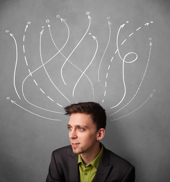 Businessman with arrows coming out of his head — Stock Photo, Image