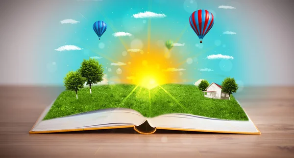 Open book with green nature world coming out of its pages — Stock Photo, Image